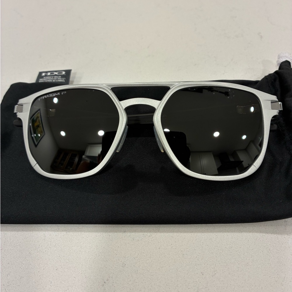 Oakley Latch Alpha: Matte Silver (Aluminum) Prizm Black Polarized Lenses. NWOT